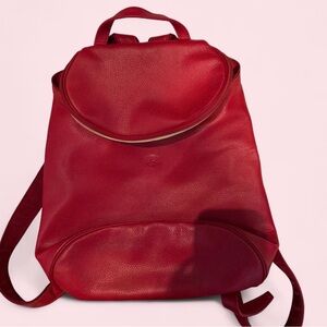 Red genuine leather Longchamp zippered backpack